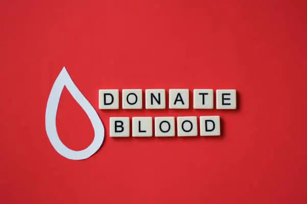 overhead-of-tiles-with-donate-blood-phrase-spelled