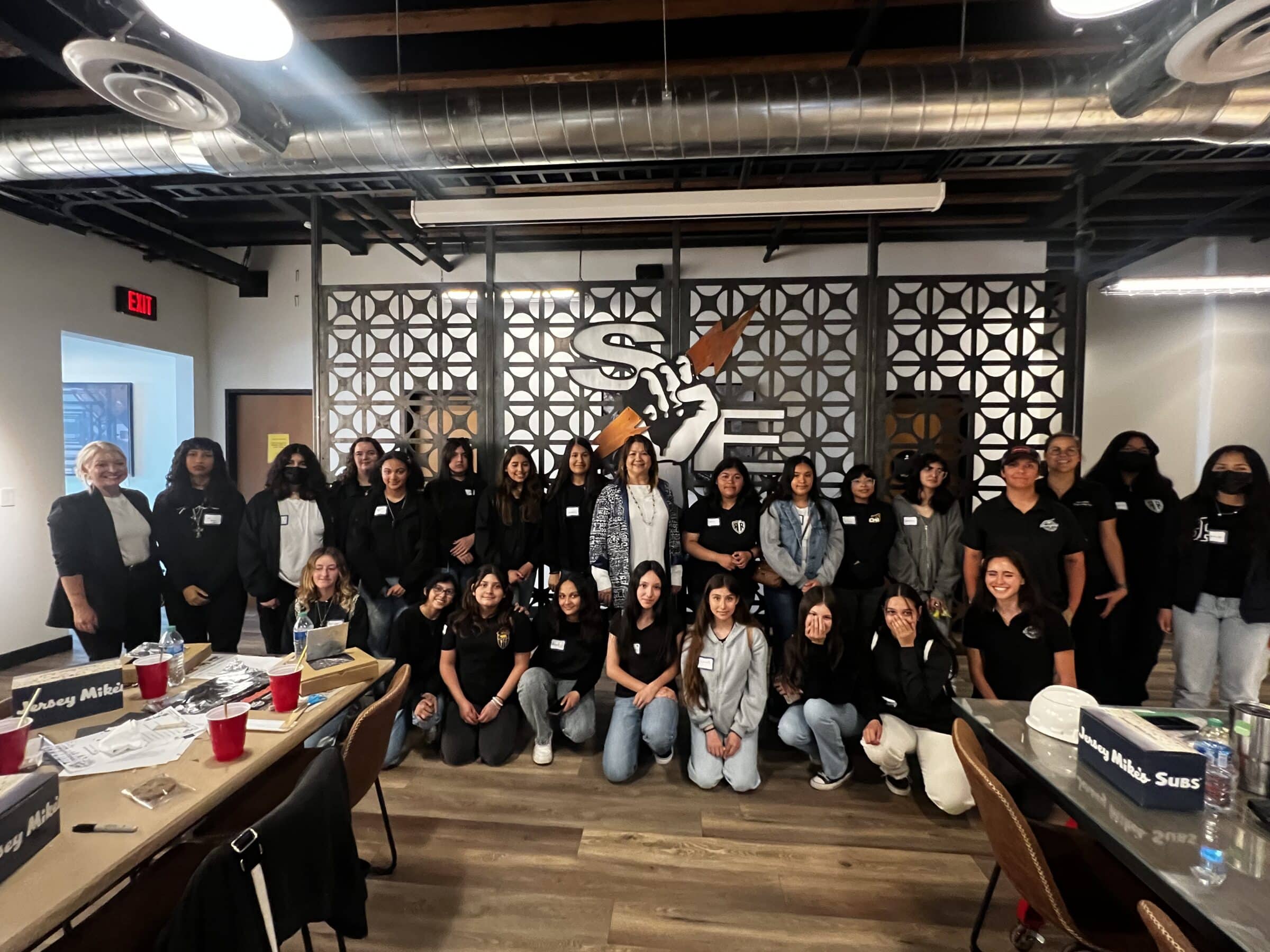 A portrait of the Girls Scouts of San Gorgonio with Stronghold Engineering.